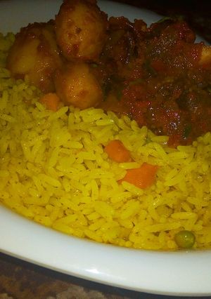 A picture of Fried rice with Irish &meat sauce.