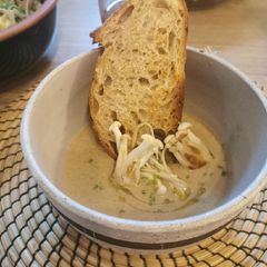 Creamy Mushroom soup, drizzle truffle oil, rustic croutons A picture of Creamy Mushroom soup, drizzle truffle oil, rustic croutons.