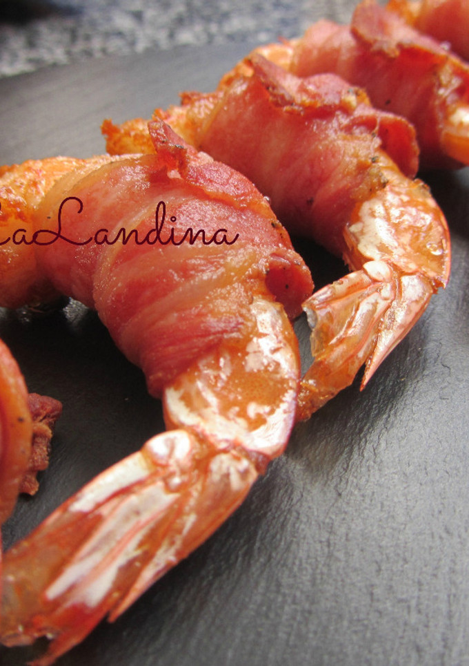 Una foto de Pincho de langostino y bacon