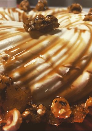 A picture of Panna Cotta with Caramel and Hazelnut Brittle.