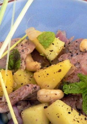 Une photo de Wok de porc à l'ananas