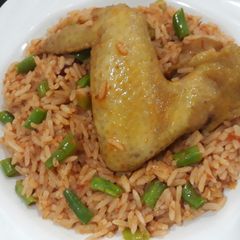 Garnished jollof rice A picture of Garnished jollof rice.