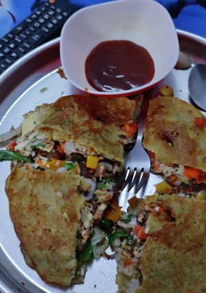 A picture of Veggies Moog,urad dal omelette dosa.
