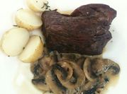 Una foto de bistec al jerez