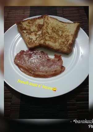 A picture of Cinnamon french toast n crispy bacon.