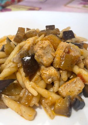 A picture of Fresh Trofie Pasta with Fresh Swordfish, Cherry Tomatoes, and Eggplant.