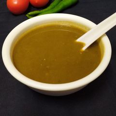 A picture of Tomato spinach soup.