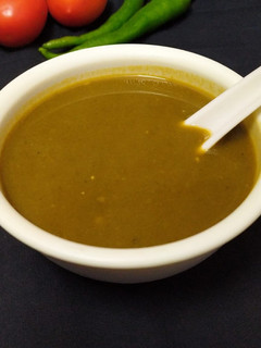 A picture of Tomato spinach soup.