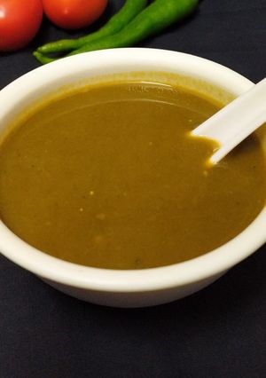A picture of Tomato spinach soup.
