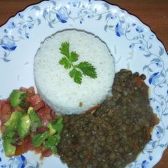 A picture of Rice served with green grams (Ndengu).