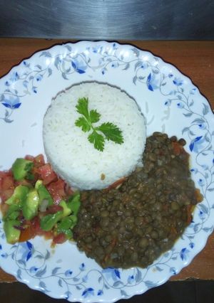 A picture of Rice served with green grams (Ndengu).