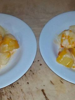 Una foto de Papas en salsa bechamel al gabinete