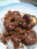 Gatuzo con salsa y arroz