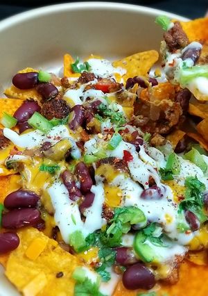 A picture of Loaded Cheesy nachos.