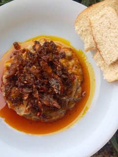 A picture of Ewa-Agonyin and its sauce/stew ("mashed bean").