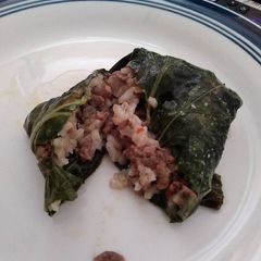 A picture of Dirty rice collard rollups.