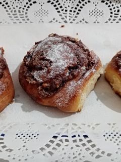 O poză a rețetei Melci cu nutella și alune de pădure.