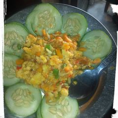 A picture of Fried cabbage and cucumber.