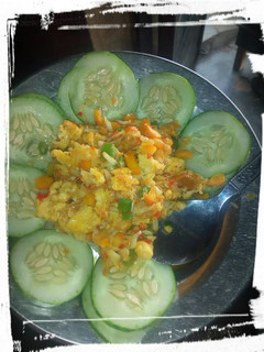 A picture of Fried cabbage and cucumber.