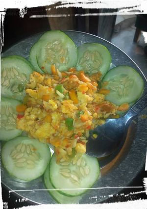 A picture of Fried cabbage and cucumber.