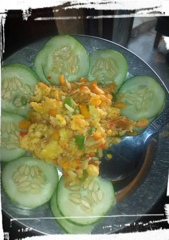 A picture of Fried cabbage and cucumber.