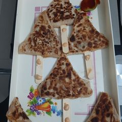 A picture of Quickfix dinner pizza paratha with wheat flour.