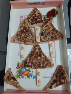 A picture of Quickfix dinner pizza paratha with wheat flour.