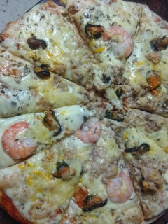 Una foto de Pizza marinera a mi estilo