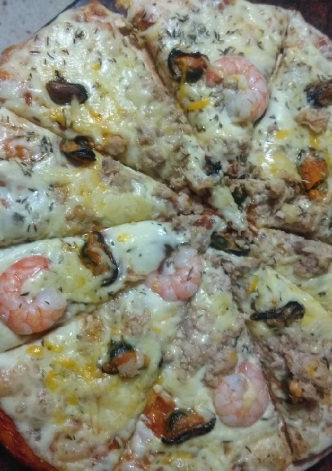 Una foto de Pizza marinera a mi estilo