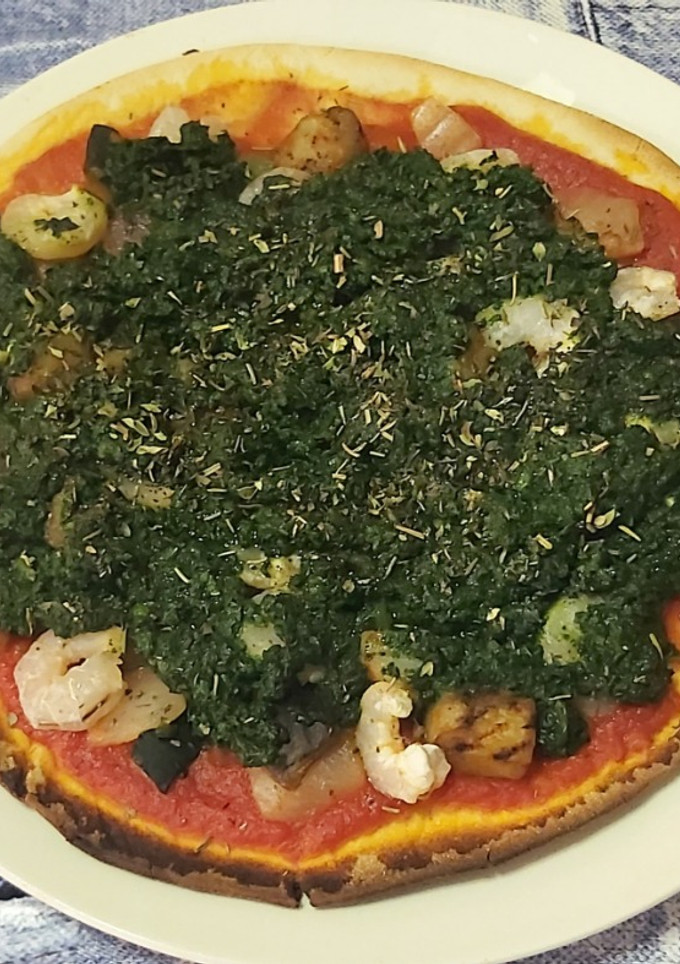 Una foto de Pizza mar y tierra