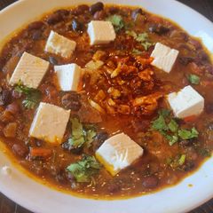 A picture of Tri-Colour Black,Pinto and Kidney Beans Masala with Feta Cheese.