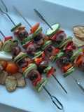 Brochetas de chorizo argentino