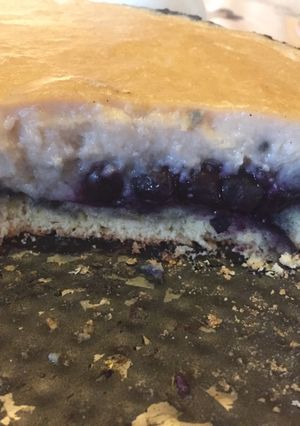 Una foto de Kuchen de arándanos y crema casera