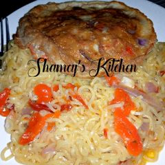 A picture of Indomie and fried egg.