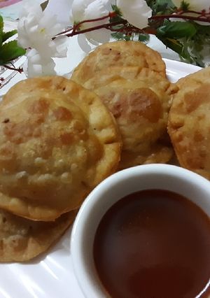 A picture of Sweet potato ravioli samosa.