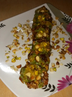 A picture of Dates dry fruits roll.