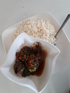 A picture of White rice and vegetable stew.