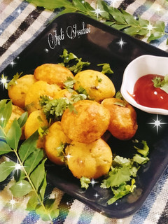 A picture of Masala paniyaRam/ masala appe.