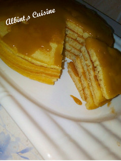 A picture of Butter Milk pancake with caramel sauce.