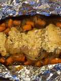 Baked chicken wing with onion and carrot