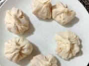 Una foto de dumplings al vapor