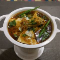 A picture of Smoked paneer in the spicy greavy.