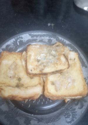ডিম পাউরুটির টোস্ট (dim pauruti toast recipe in bengali) রেসিপির প্রধান ছবি