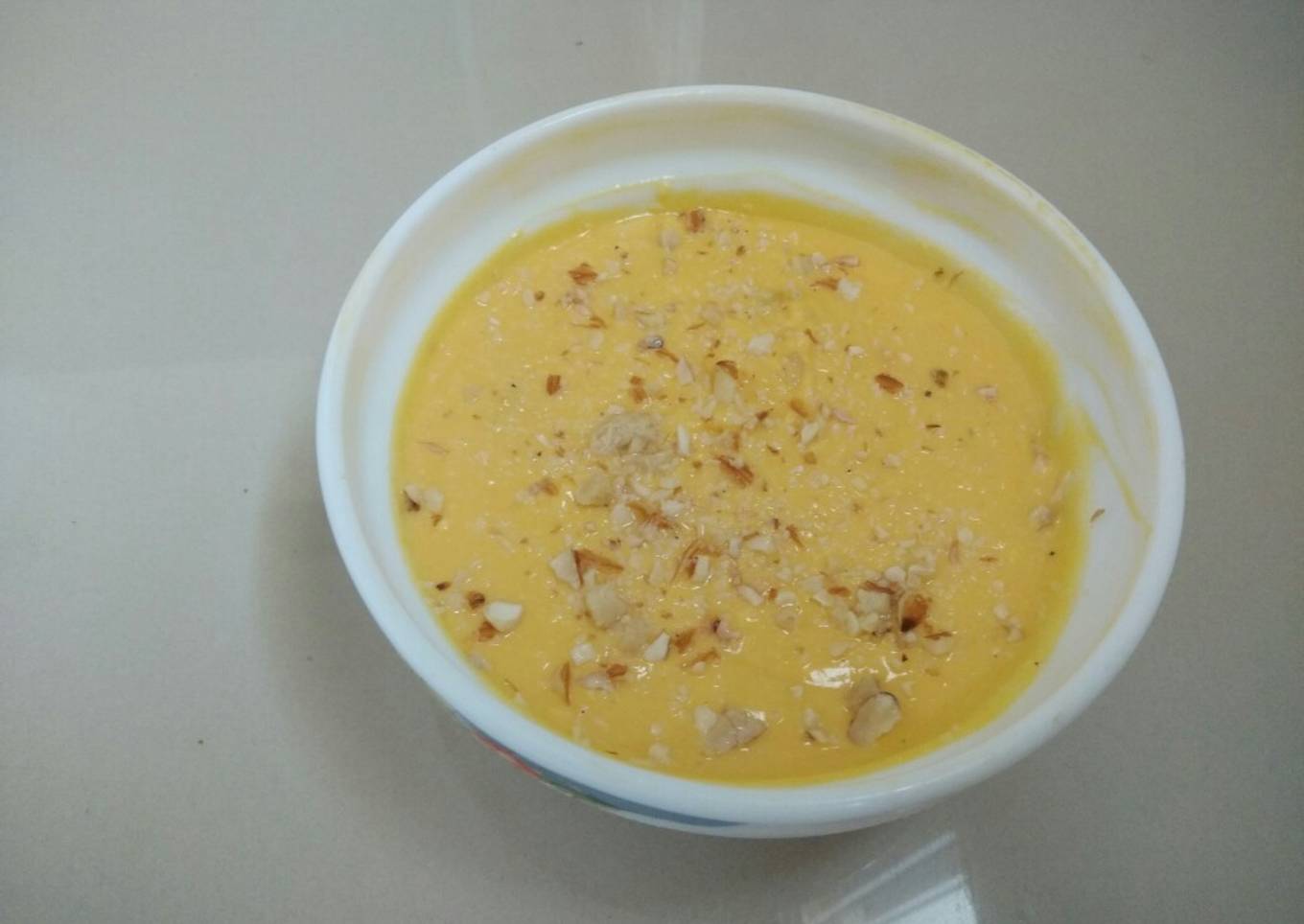 Amrakhand (mango flavoured sweetened curd)