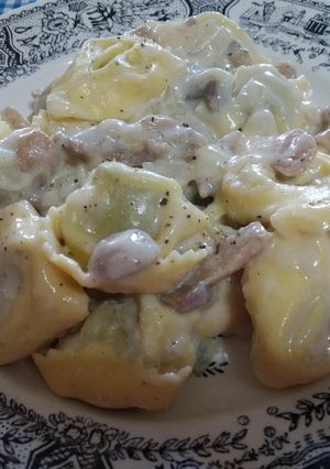 Una foto de Raviolis en salsa de setas