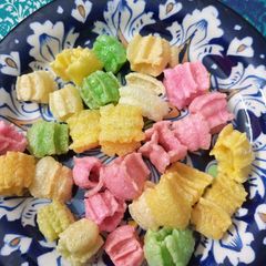 A picture of Yum colorful papad.