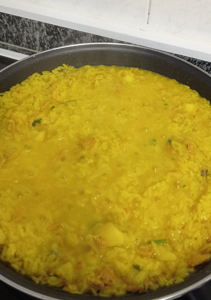 Una foto de Arroz con sepia y pollo