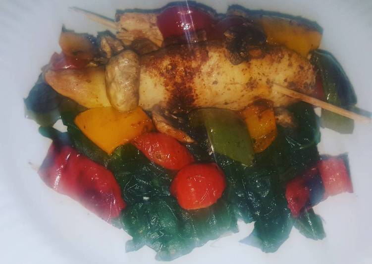 Grilled chicken breasts with vegetables