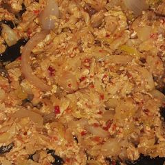 A picture of Cabbage and egg sauce.
