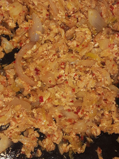 A picture of Cabbage and egg sauce.